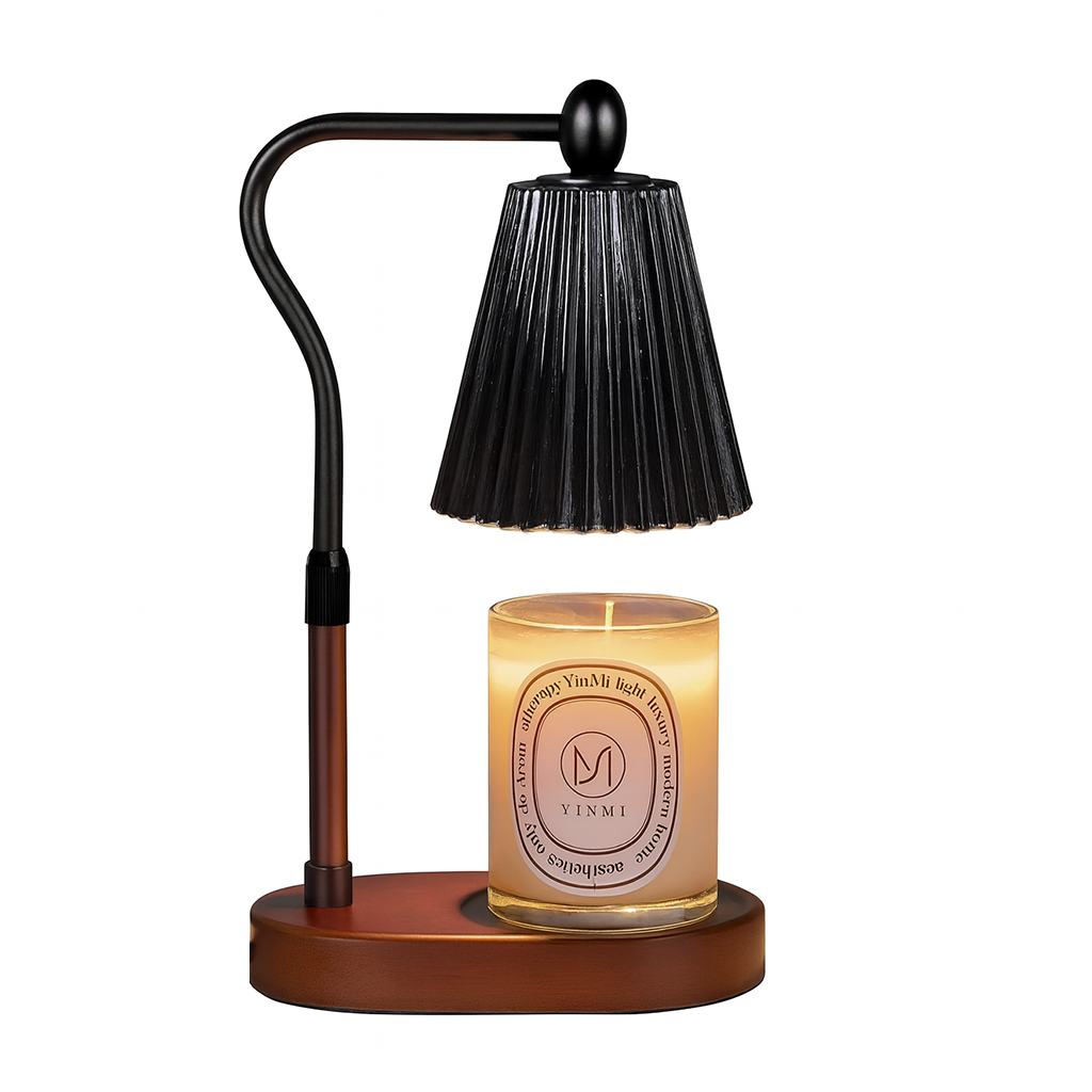 Black candle warmer lamp with a ribbed black lampshade and a lit scented candle on a wooden base, displayed on a white background.