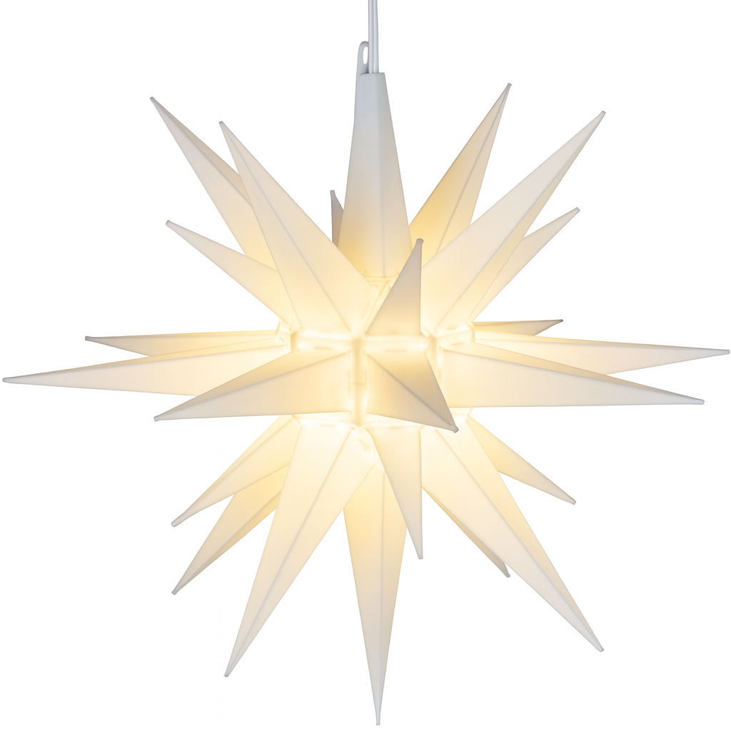 Moravian star hanging light emitting a warm glow, photographed on a white background.